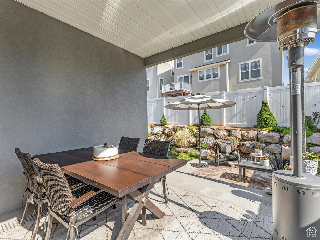View of patio with outdoor dining space