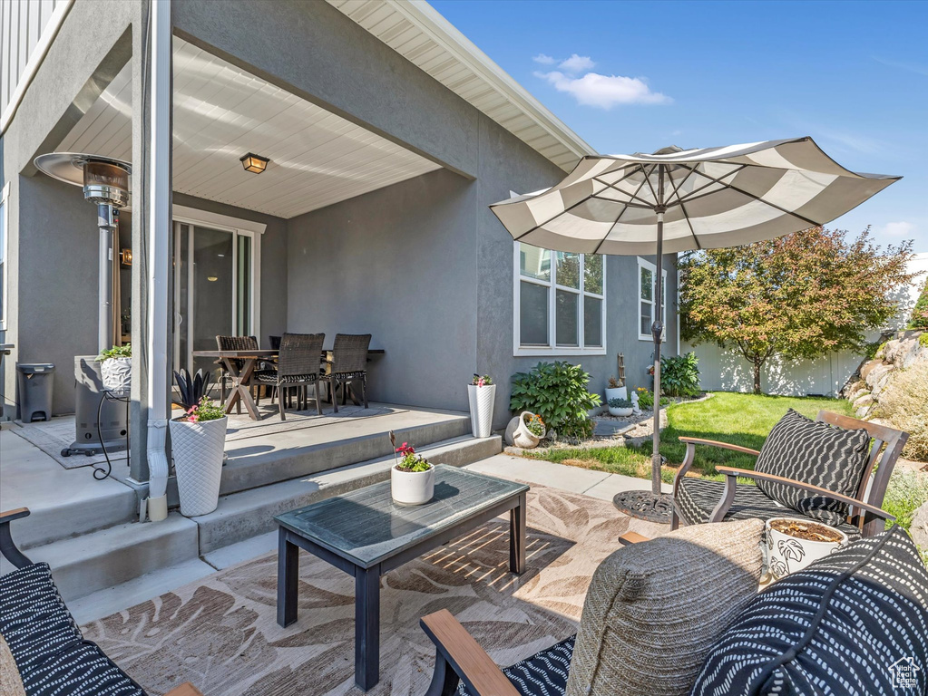 View of patio with outdoor dining space