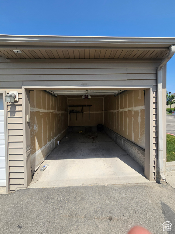 Garage featuring a garage door opener