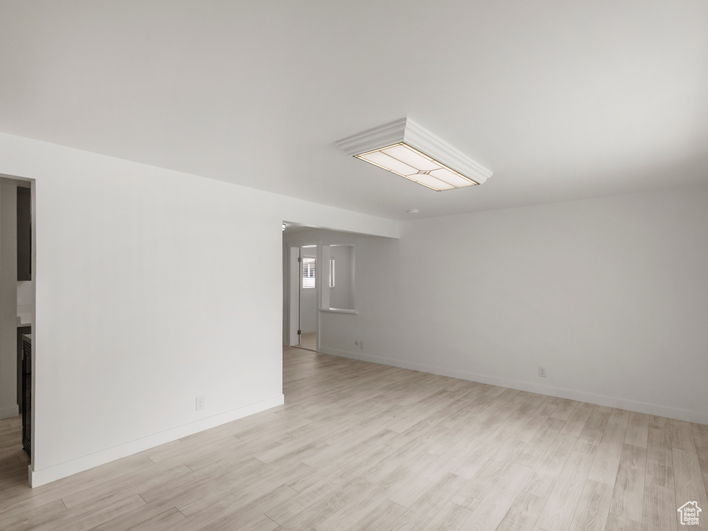 Empty room with light wood-type flooring