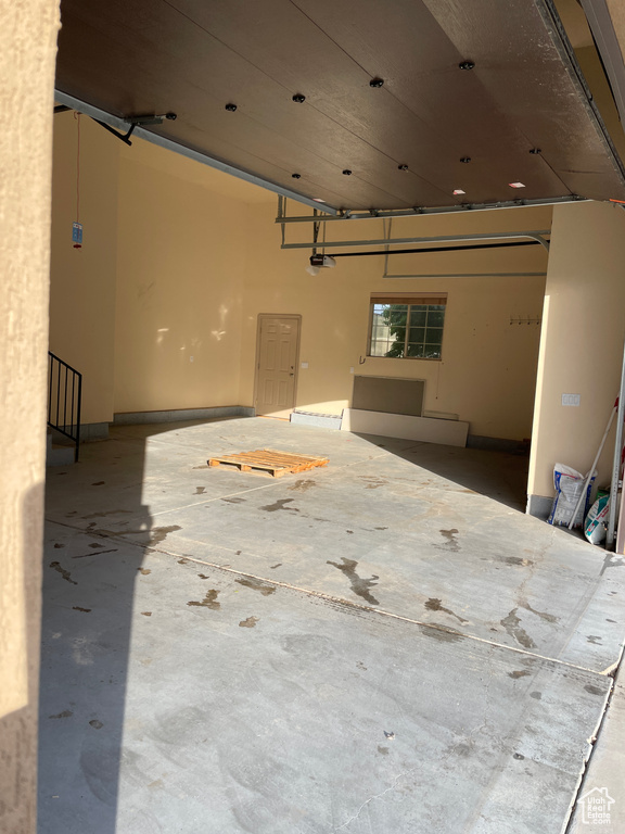 Garage featuring a garage door opener