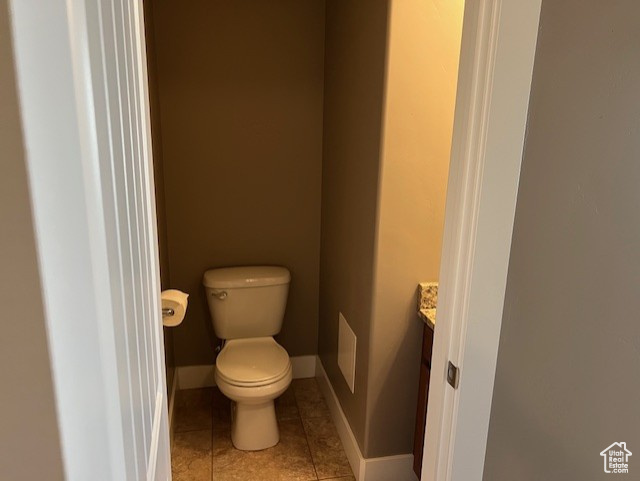 Bathroom with vanity and tile patterned flooring