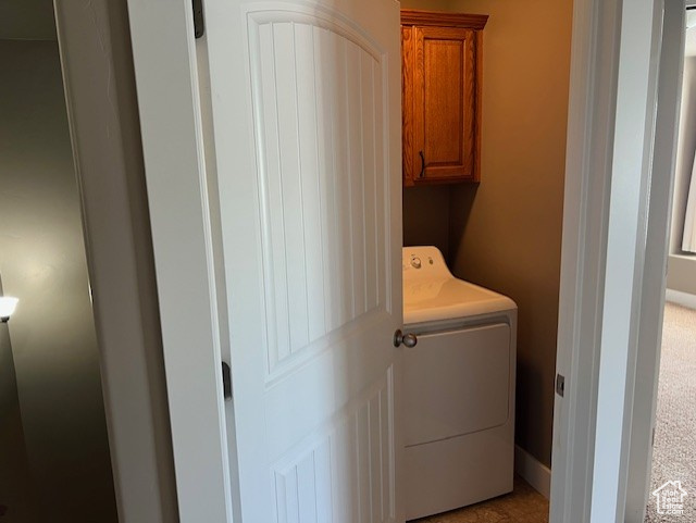 Laundry area with washer / clothes dryer and cabinet space