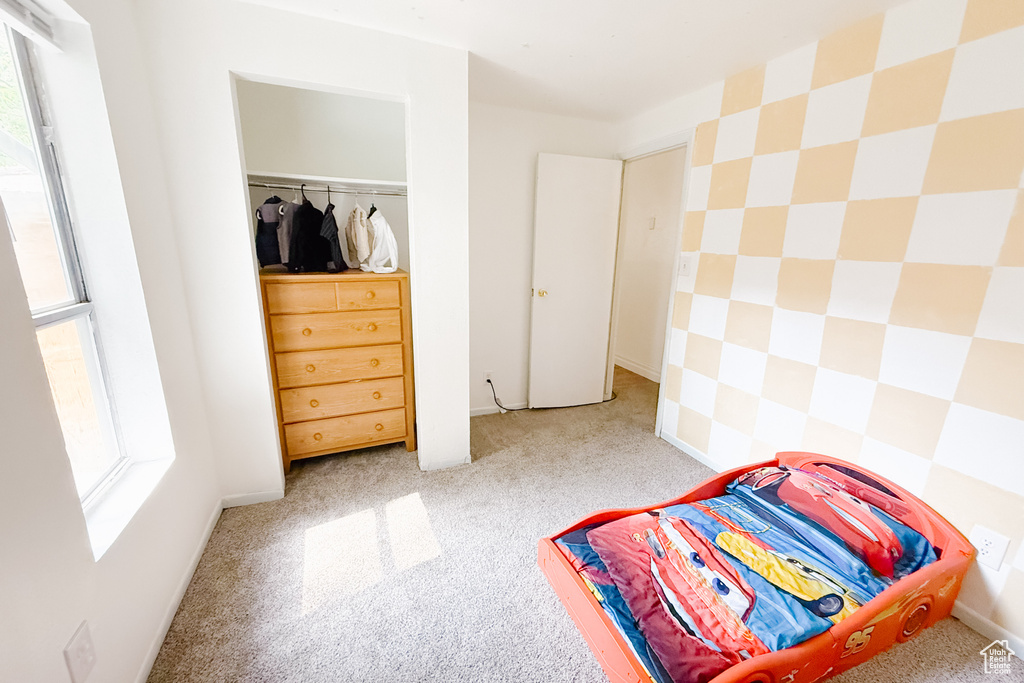 View of carpeted bedroom