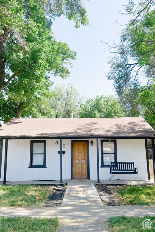 View of front of property with a porch