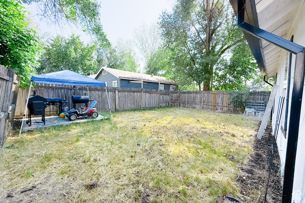 View of fenced backyard