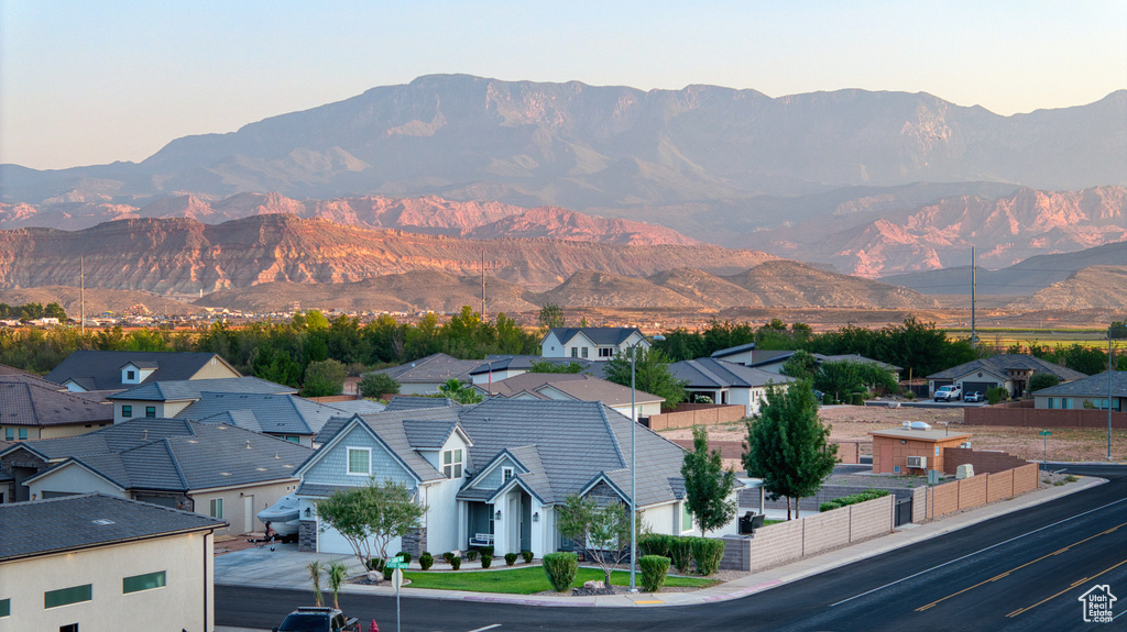View of mountain background featuring nearby suburban area