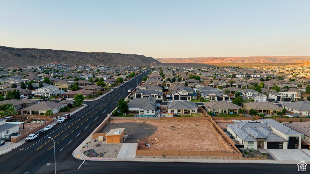 Aerial view at dusk of a residential view and a mountain view
