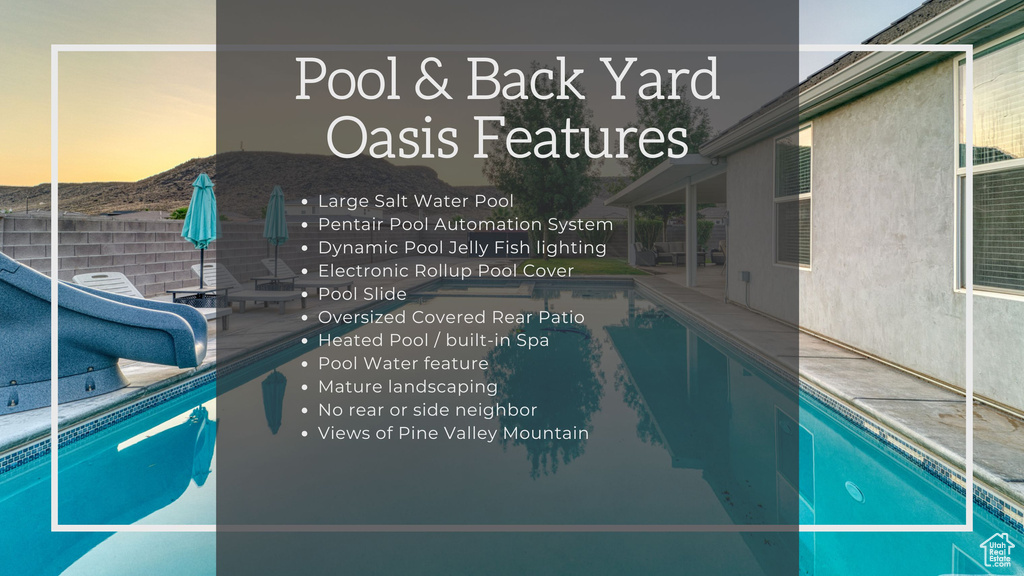 View of swimming pool featuring a water slide, a patio area, and a mountain view