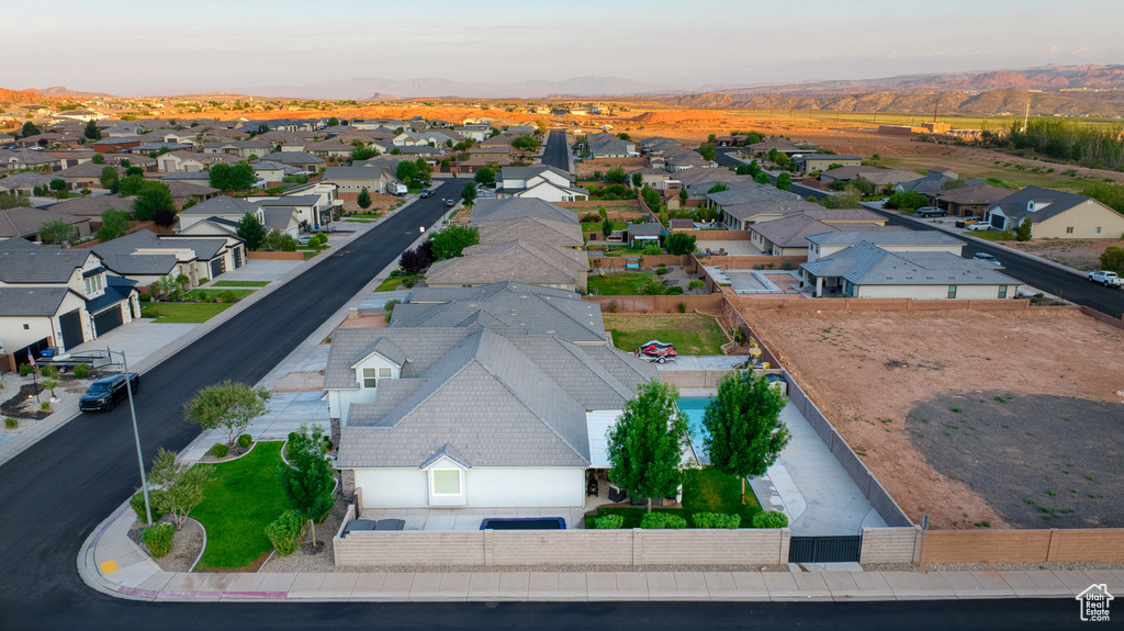 Aerial view of residential area with mountains
