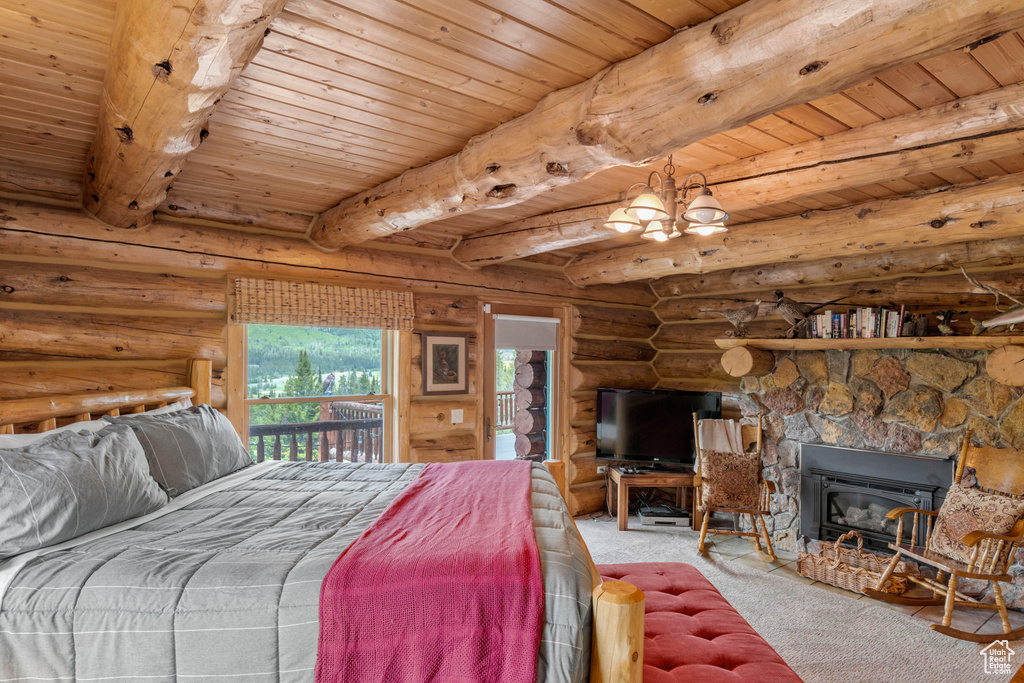 Bedroom with carpet flooring, a wooden ceiling with exposed beams, log walls, and a chandelier