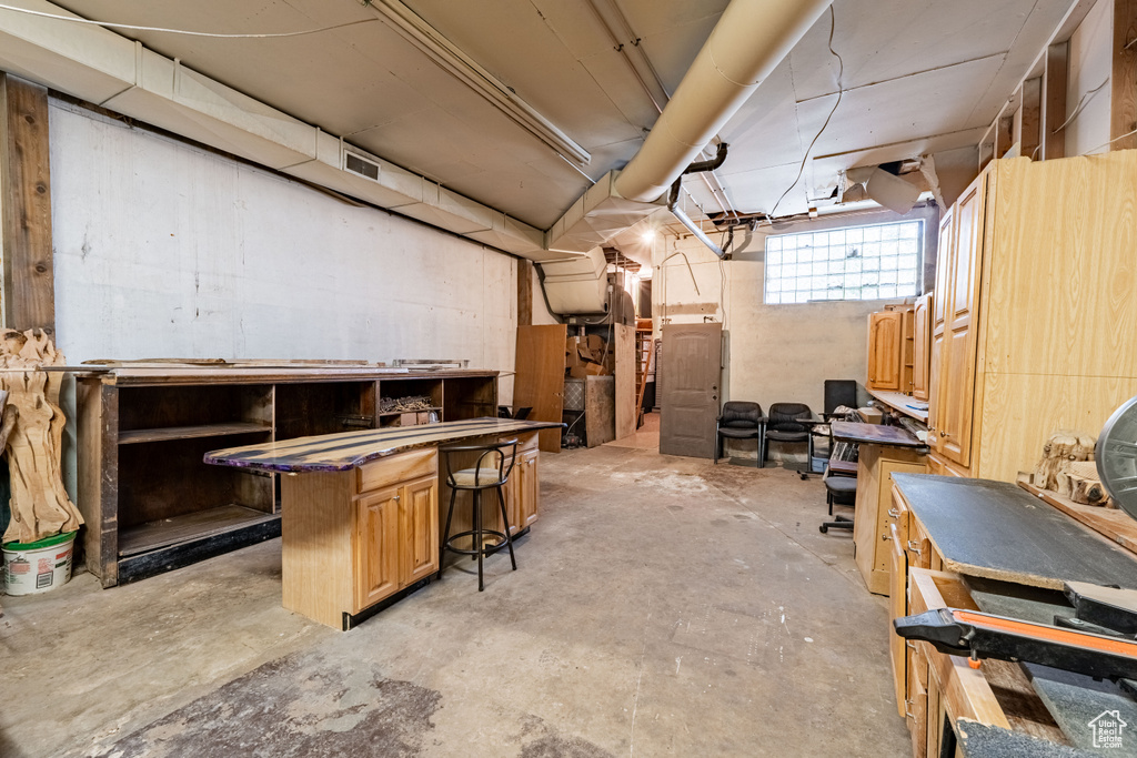Basement with a workshop area