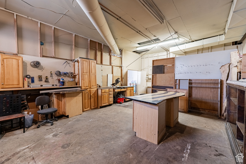 Below grade area with a workshop area