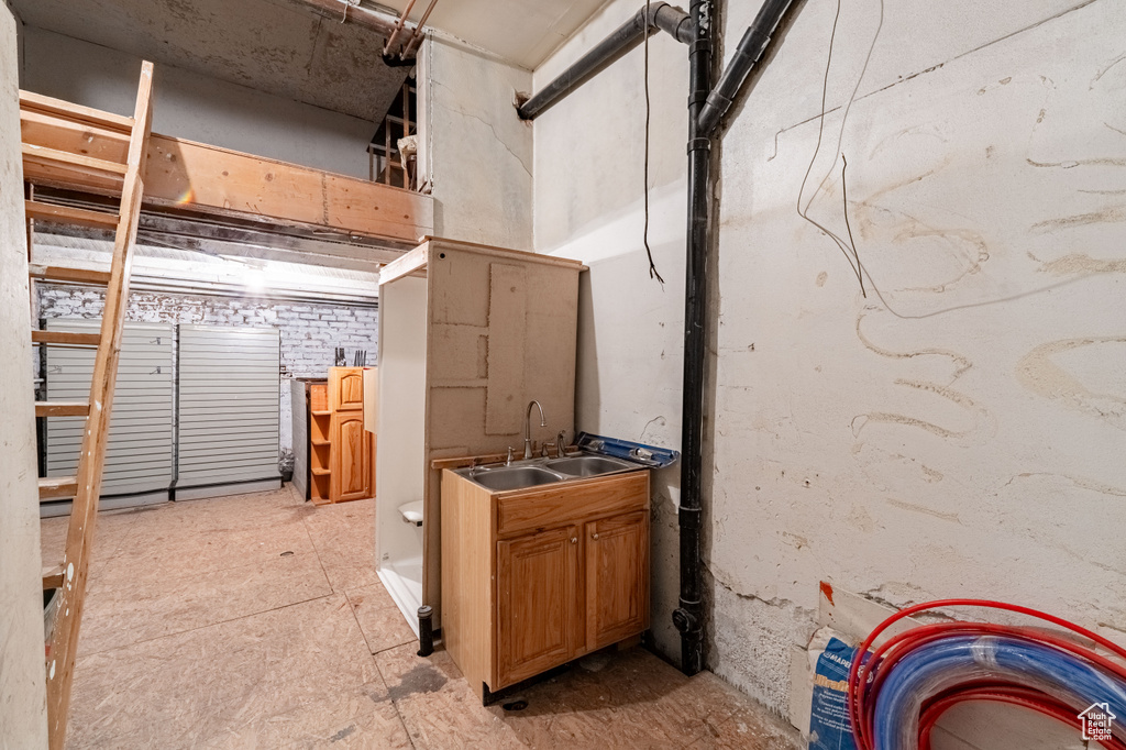 Unfinished basement with a sink