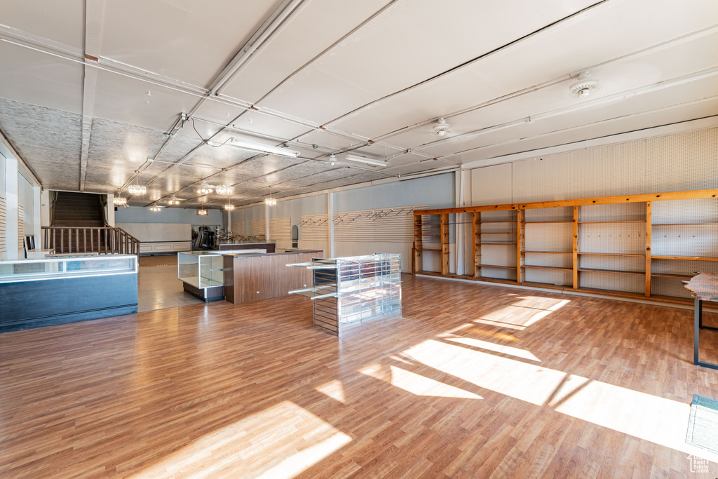 Below grade area featuring light wood-type flooring