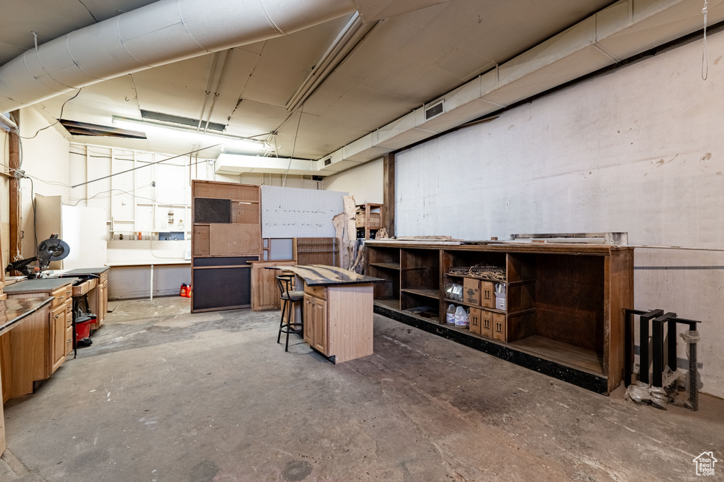Below grade area with a workshop area
