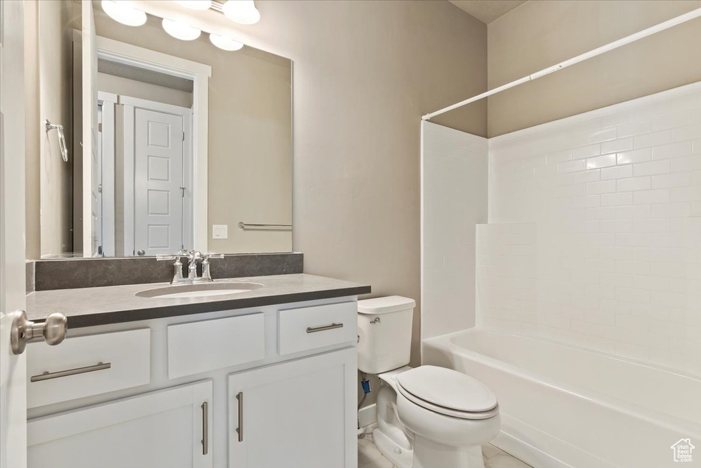 Full bathroom featuring vanity and bathing tub / shower combination