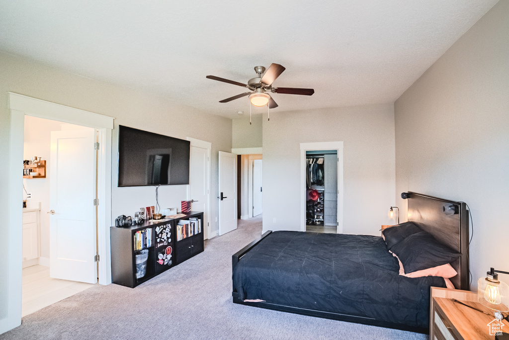 Bedroom featuring carpet flooring and ceiling fan