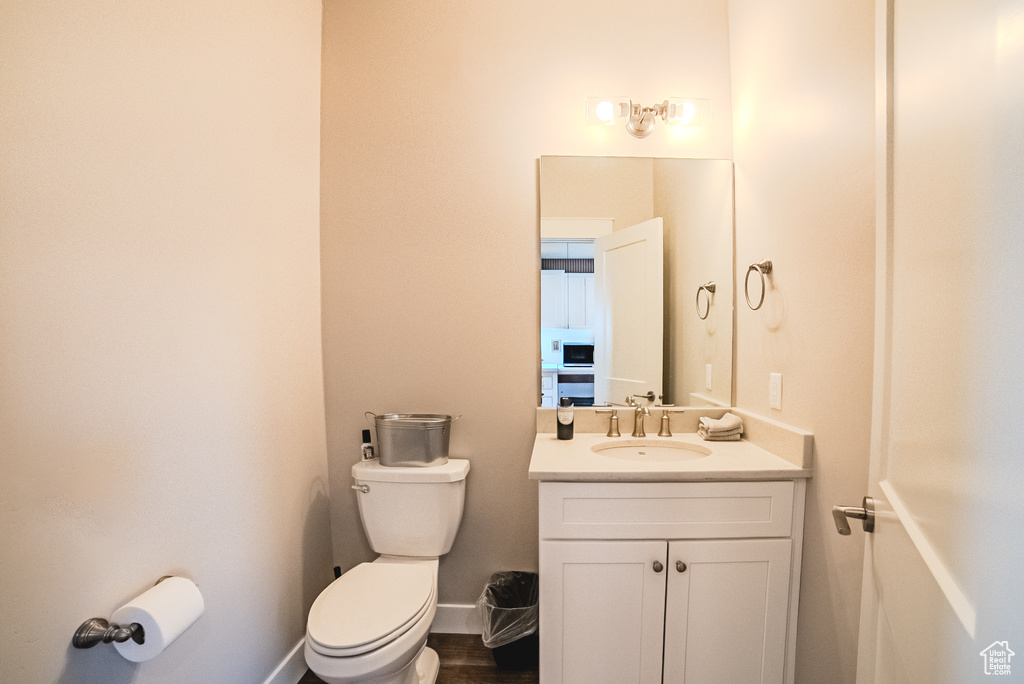 Bathroom featuring toilet and vanity