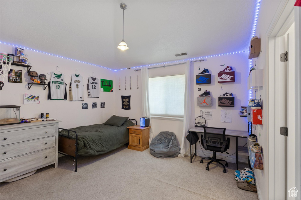 Bedroom featuring carpet flooring