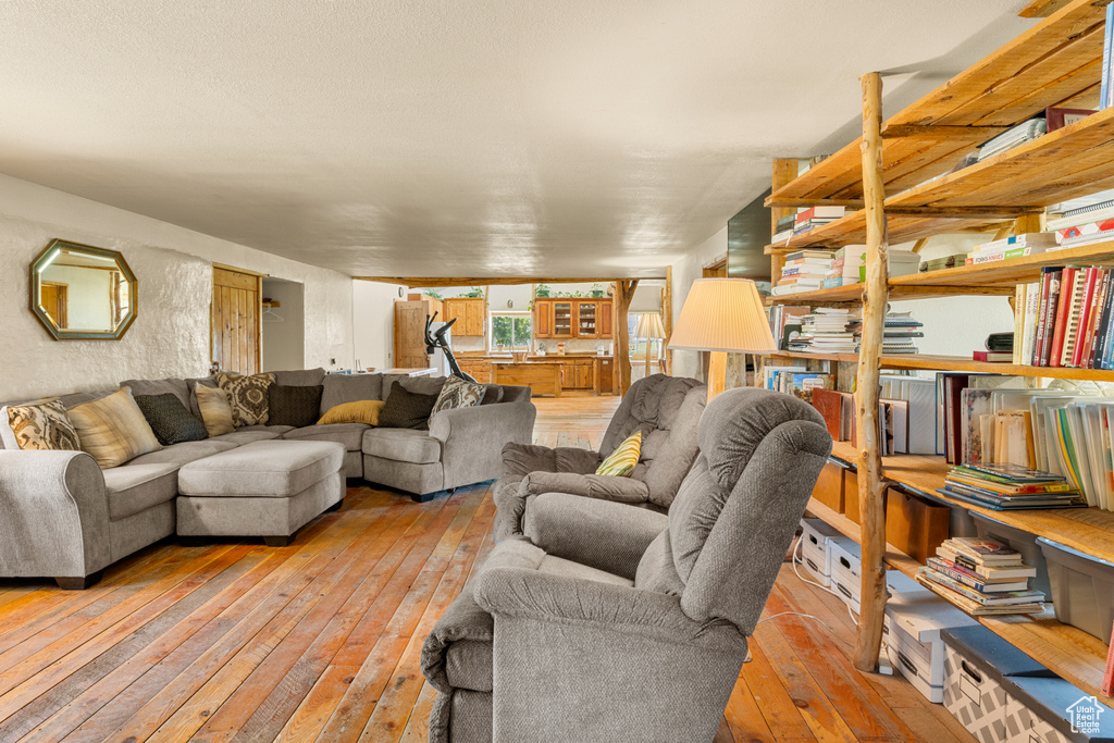Living area with light wood finished floors