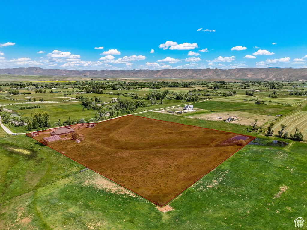 Overview of rural landscape featuring mountains and property boundaries highlighted