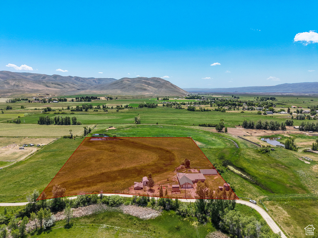 View of rural area with a mountainous background