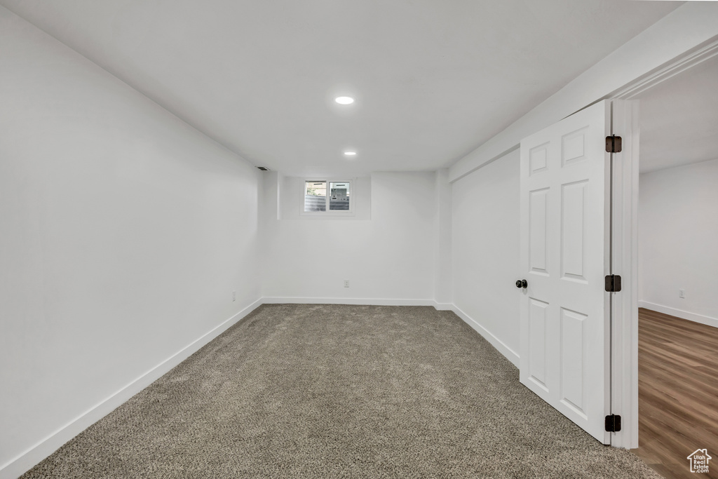 Basement with recessed lighting and carpet flooring