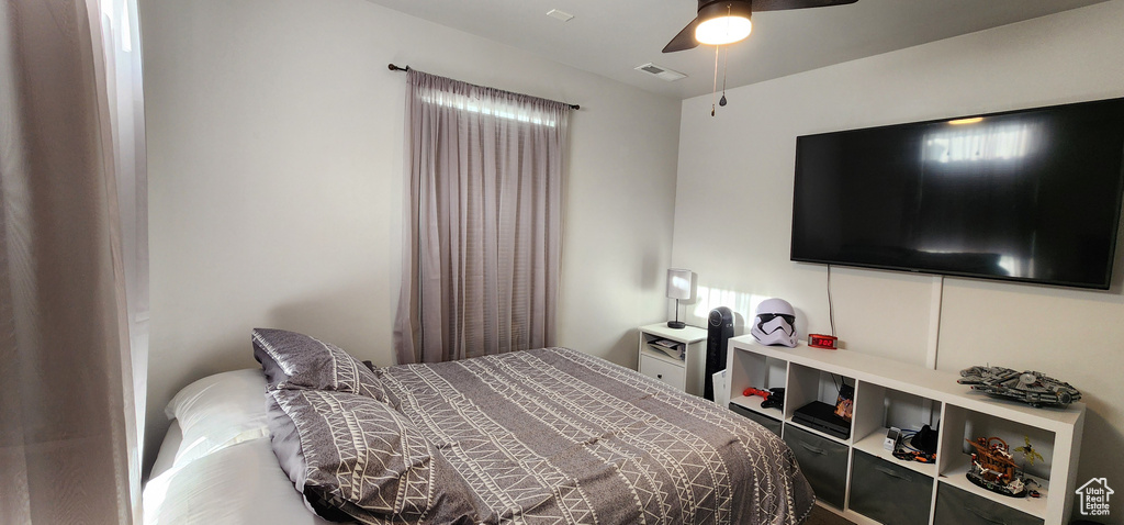 Bedroom with a ceiling fan
