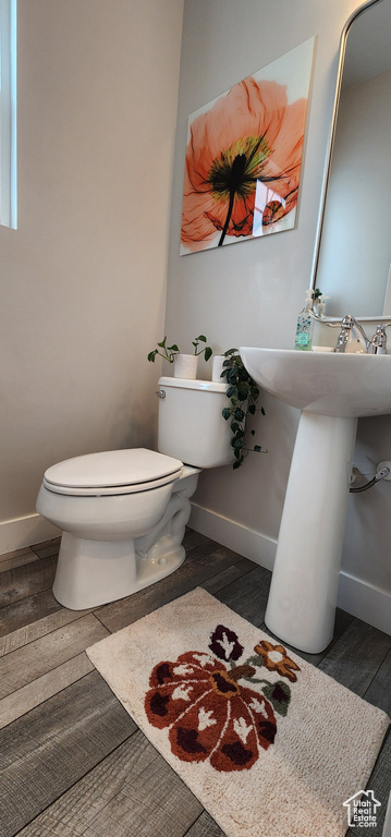 Bathroom with wood finished floors