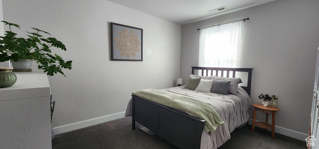 Bedroom with carpet