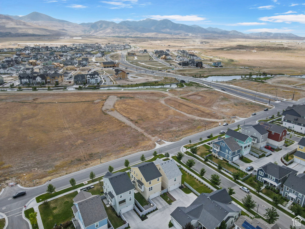 Aerial view of residential area with a mountainous background