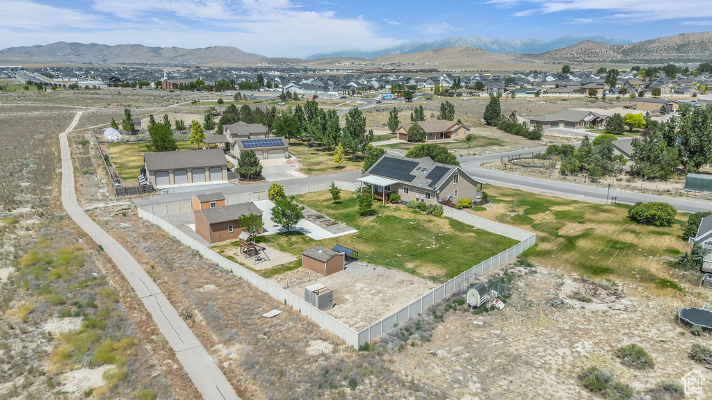Aerial perspective of suburban area with mountains