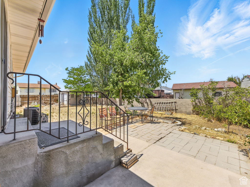 Fenced backyard featuring a patio area