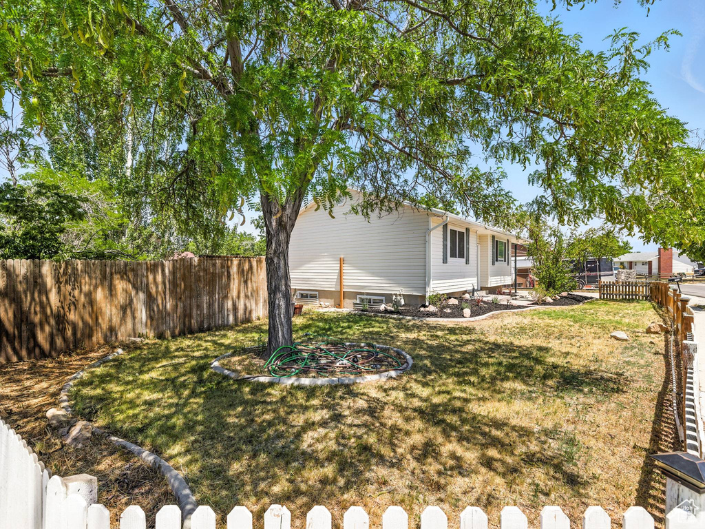 View of fenced backyard