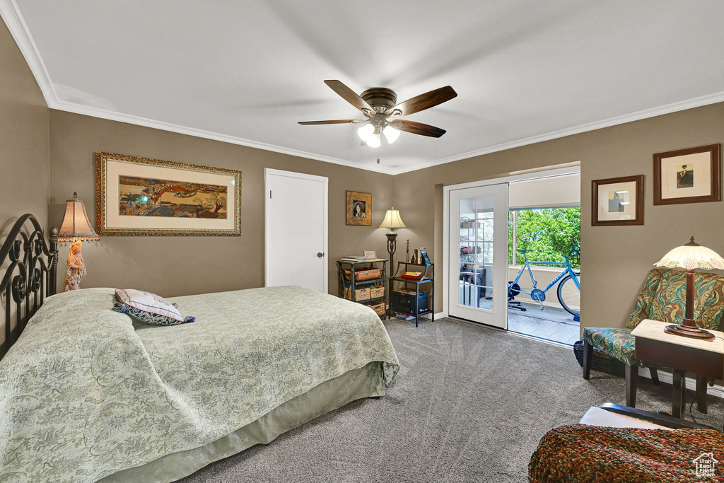 Bedroom featuring access to outside, crown molding, carpet floors, and a ceiling fan