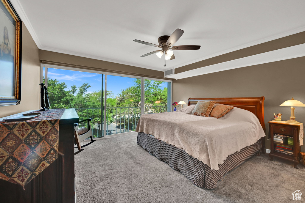 Carpeted bedroom featuring crown molding, a ceiling fan, and access to exterior
