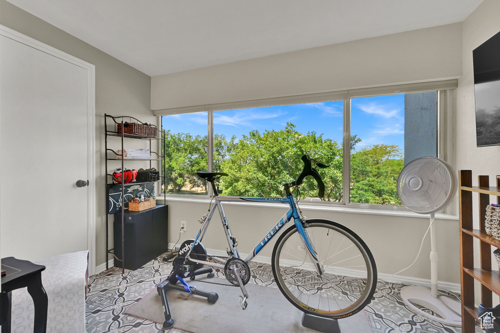 Exercise room featuring baseboards