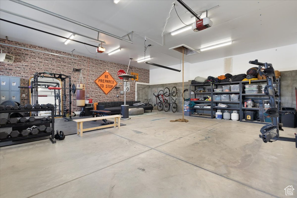 Garage featuring a garage door opener