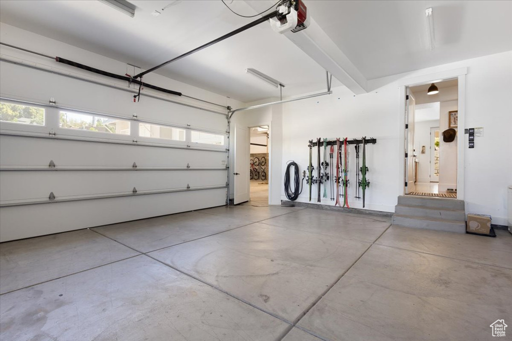 Garage featuring a garage door opener