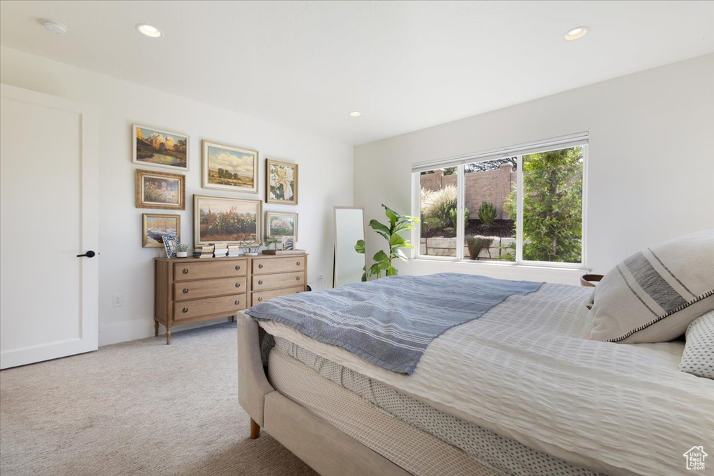 Bedroom with carpet floors and recessed lighting