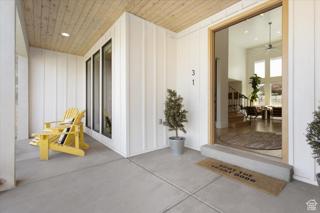 Entrance to property featuring board and batten siding