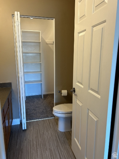 Bathroom featuring toilet and vanity