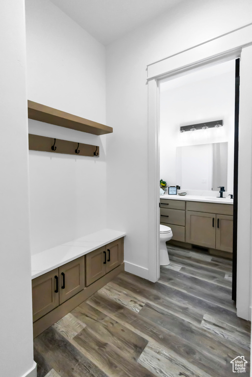 Mudroom with wood finished floors