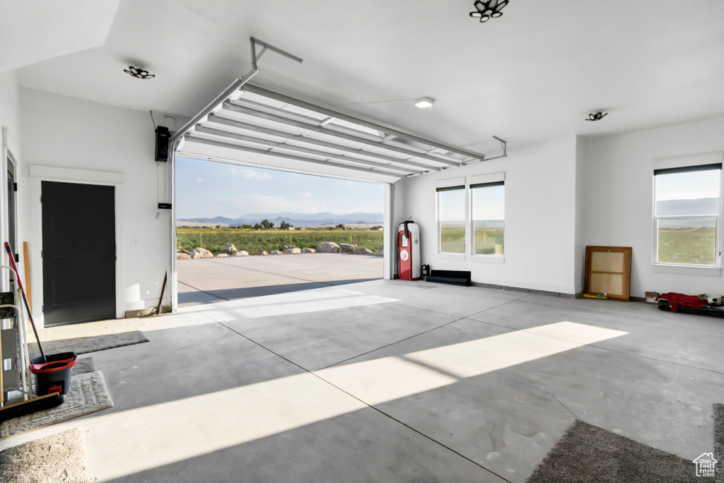 Garage featuring a mountain view