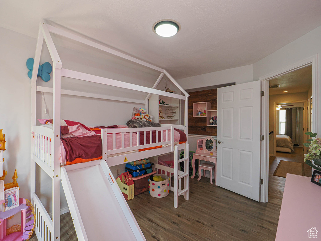 Bedroom with wood finished floors