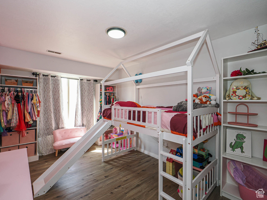 Bedroom featuring wood finished floors