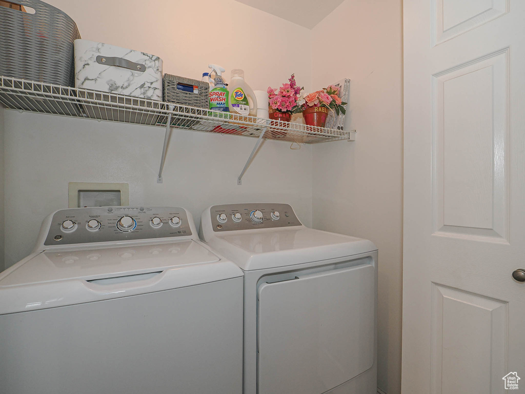 Laundry room with separate washer and dryer