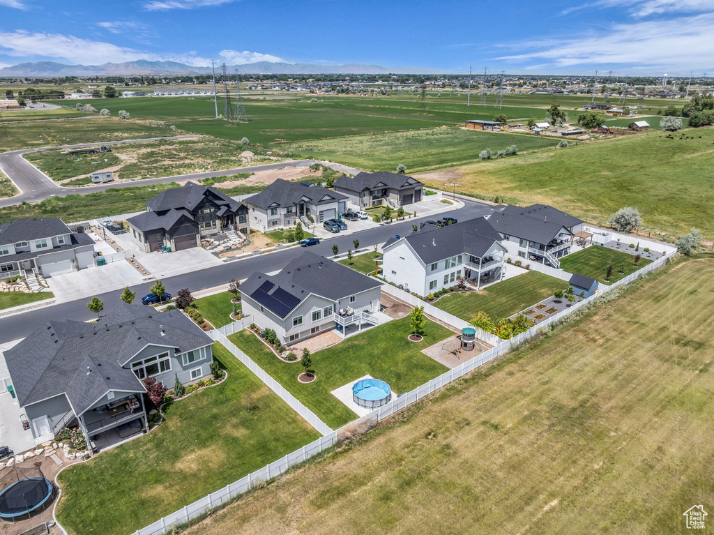 Aerial view of residential area with a mountainous background
