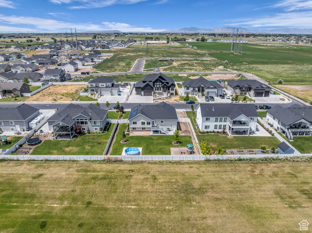 Aerial view of residential area with a mountain backdrop